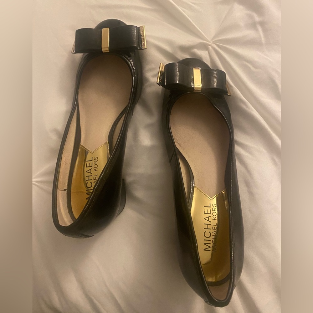 Michael Kors black patent leather low heel with gold detail